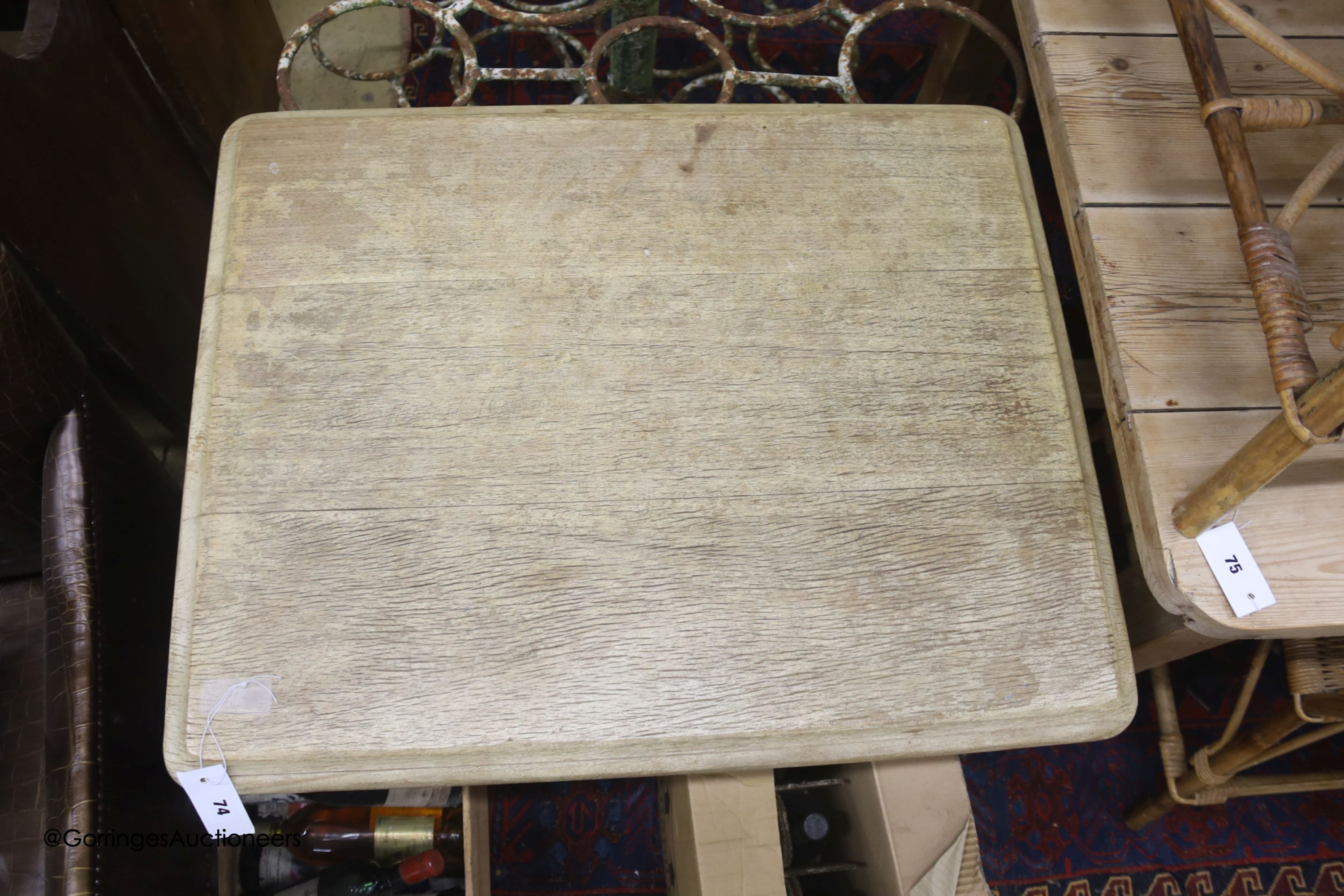 An Art Deco cast iron and oak rectangular centre table, width 75cm, depth 60cm, height 76cm